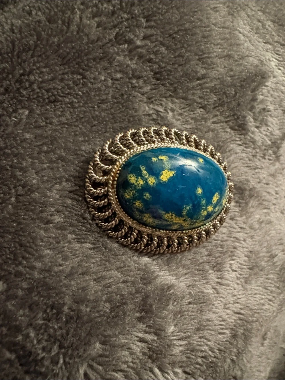 Blue and Yellow Speckled Lucite? Oval Brooch with Silver-Tone Rope Frame